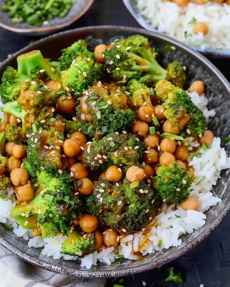 Colorful broccoli chickpea stir fry served in a bowl with vibrant vegetables.