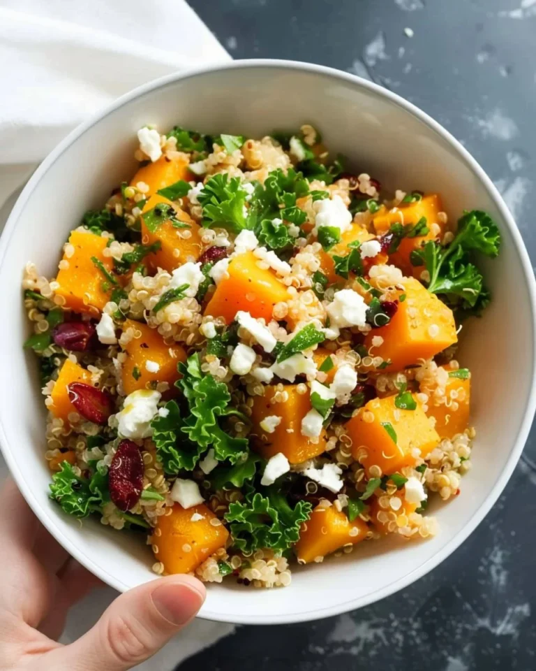 Butternut squash and quinoa salad with fresh greens and dressing